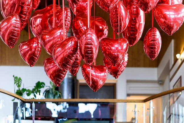 Bunch red heart shaped balloons