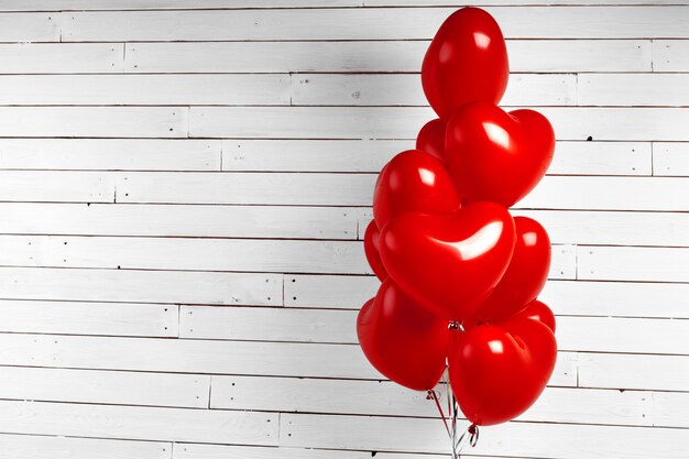 Bunch of red hearted-shaped balloons