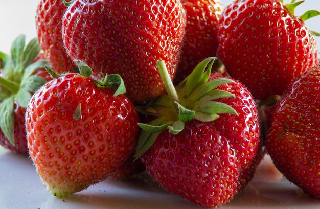 Bunch of red ripe fresh strawberries in a basket