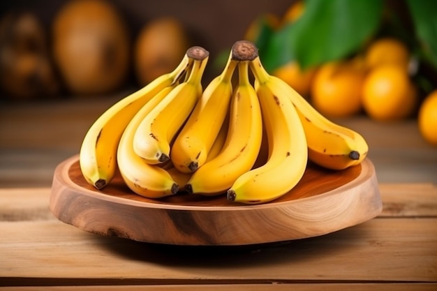 木製の皿に ⁇ まった熟した果実のバナナの束