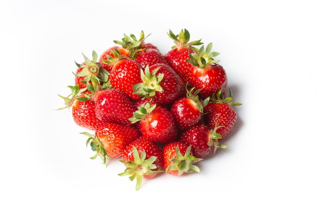 A bunch of ripe strawberries on a white background