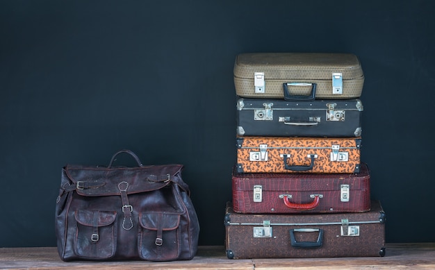 a bunch of vintage leather suitcases