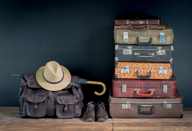 a bunch of vintage leather suitcases