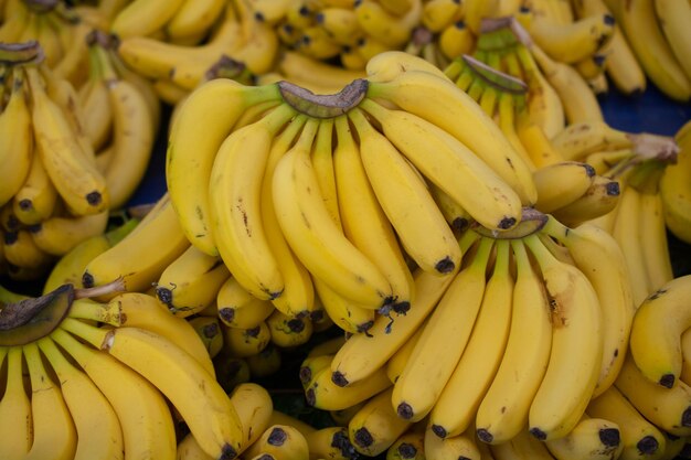 Bunch of yellow bananas fruit at market