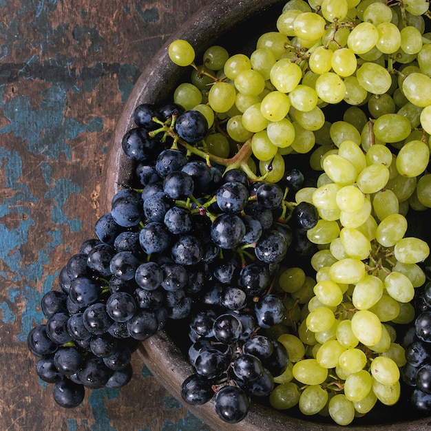 Bunches of red and white grapes