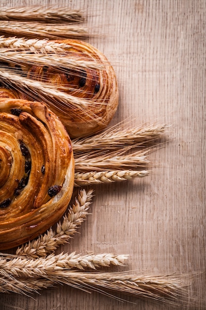 Bunches of wheat ears pastry with raisins