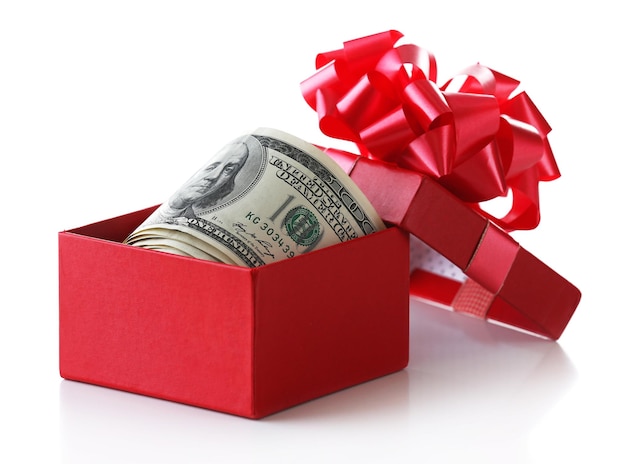 Photo bundle of dollars in present box with bow isolated on white