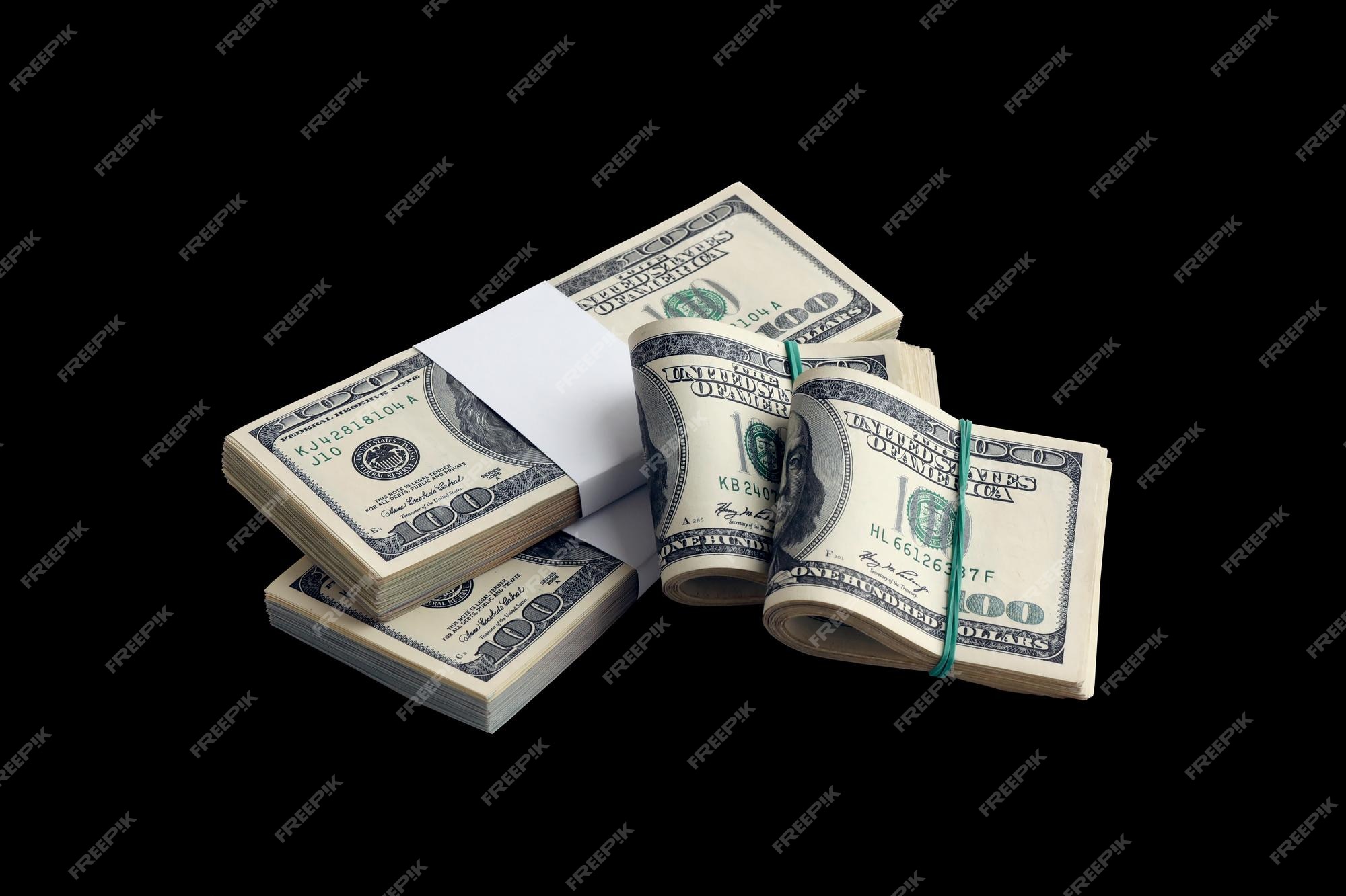 Premium Photo | Bundle of us dollar bills isolated on black pack of  american money with high resolution on perfect black background