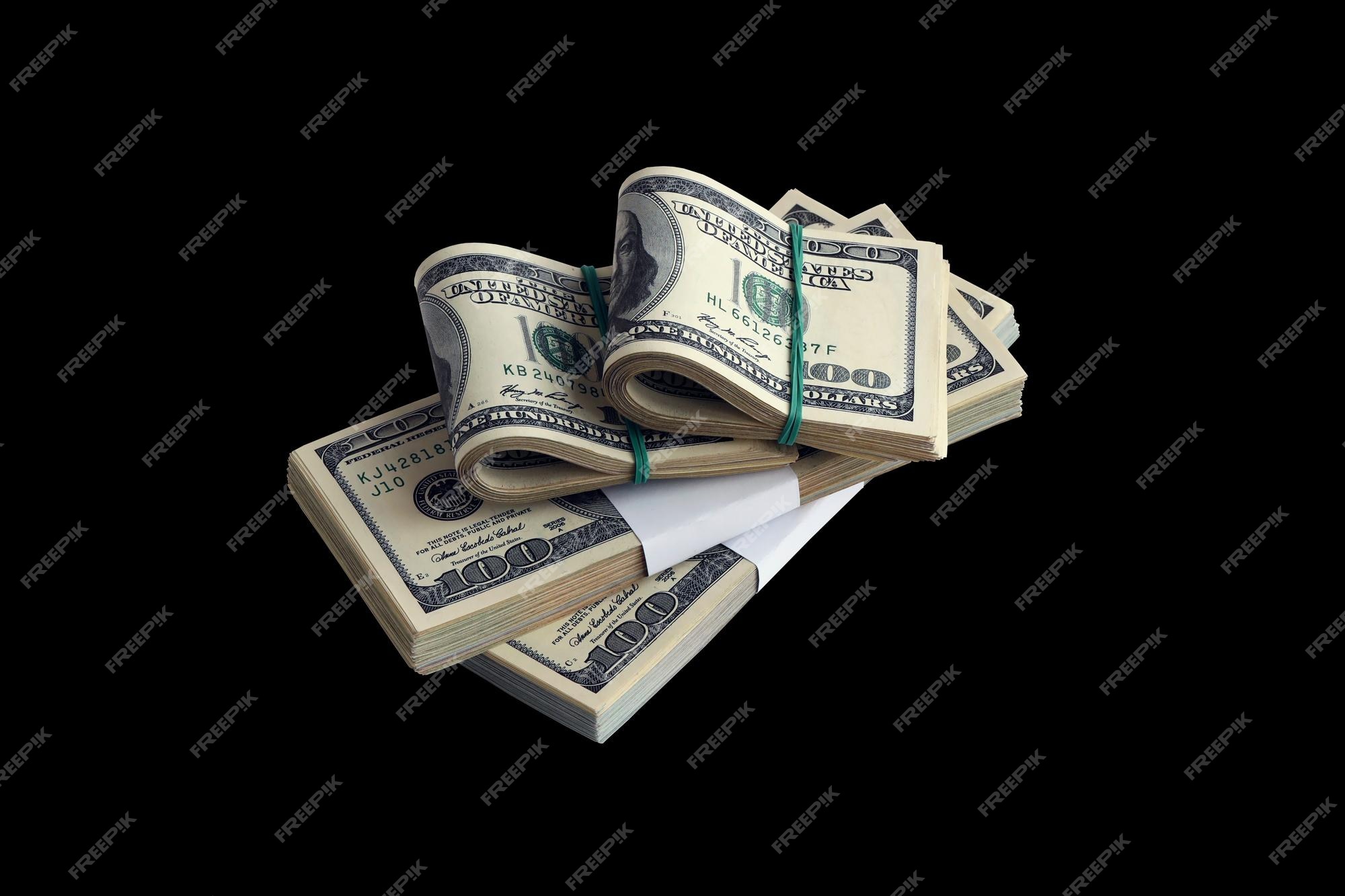 Premium Photo | Bundle of us dollar bills isolated on black pack of  american money with high resolution on perfect black background