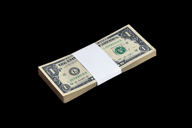 Bundle of US dollar bills isolated on black Pack of american money with high resolution on perfect black background