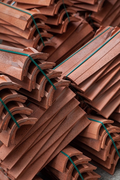 Bundles of earthen tiles on a building site