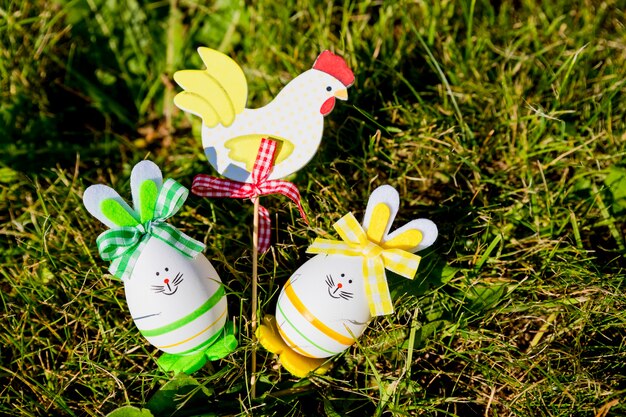 Bunny shaped easter eggs on green grass