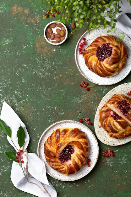 Buns with almond cream frangipane and red currant jam