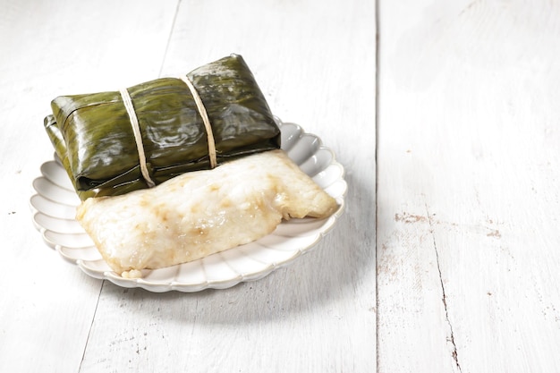 Buras or Burasa, is rice dumpling cooked in coconut milk wrapped in banana leaf. A traditional food.