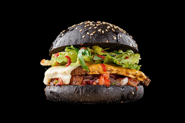 Burger on a black background for the menu