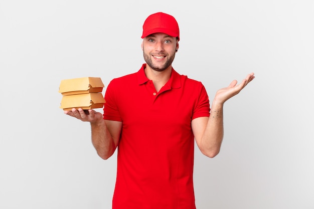 Burger deliver man feeling happy and astonished at something unbelievable