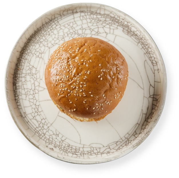 Photo burger on dish isolated. top view