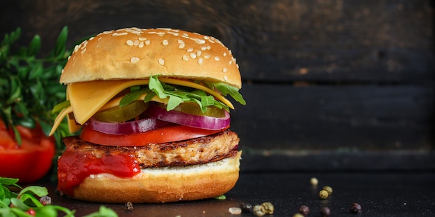 burger, meat cutlet beef steak, tomato, sauce and lettuce