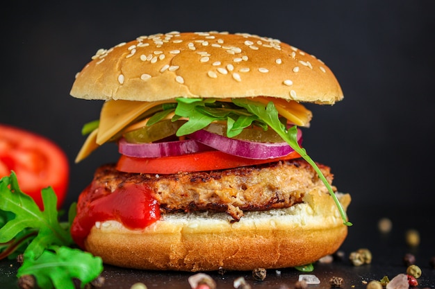 burger, meat cutlet beef steak, tomato, sauce and lettuce