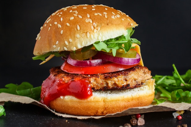 burger, meat cutlet beef steak, tomato, sauce and lettuce