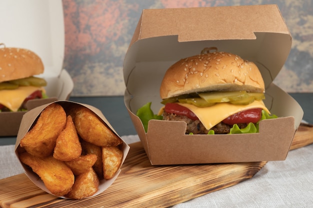 Burger in paper box for delivery