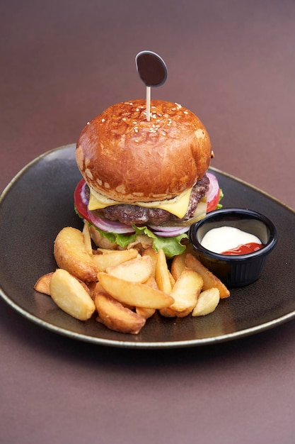 Burger and potatoes fries Hamburger with cheese