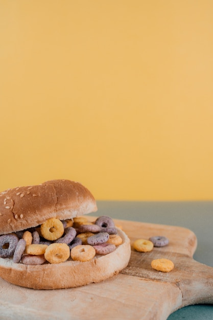 burger with cereals on table