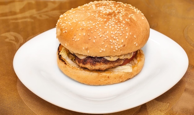 Burger with cutlet on the plate at the bar