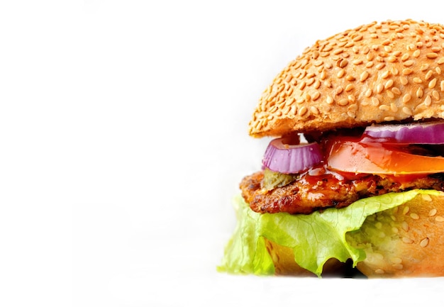 Burger with red onion meat tomato ketchup Sesame buns large lettuce White isolate