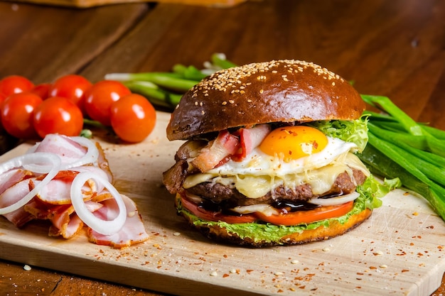 burgers with beef, meat, cheese, tomatoes, sauce, pineapple, fresh greens, eggs, mushrooms