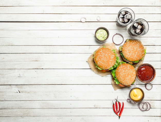 Burgers with cola and various sauces