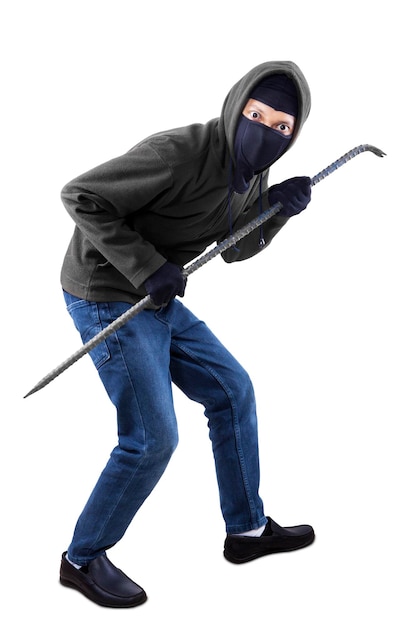 Photo burglar holding crowbar against white background