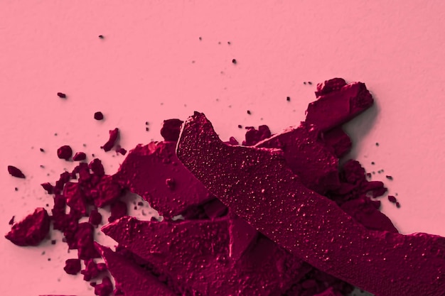 Burgundy eye shadow powder as makeup palette closeup crushed cosmetics and beauty texture