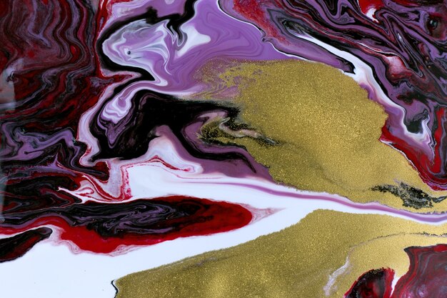 Burgundy mixed ink texture. Abstract marble pattern imitation with gold dust.
