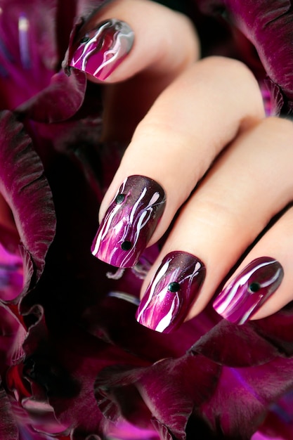 Burgundy nail design with white lines