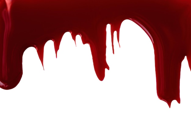 Burgundy nail polish drops flow down on white background Red gel paint color dripping on the white