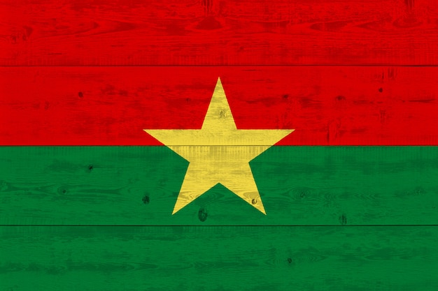 Burkina faso flag painted on old wood plank