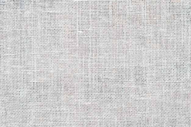 Photo burlap texture canvas cloth light gray woven rustic bagging natural hessian jute textile texture white linen fabric pattern threads background sackcloth surface sacking material
