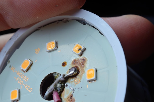 A burned-out LED in an energy-saving lamp. close-up.