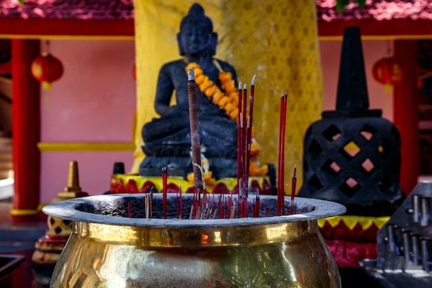 Burning aromatic incense sticks. Incense for praying Buddha or Hindu gods to show respect.