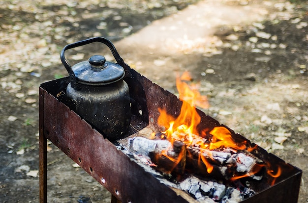 Photo burning brazier with a kettle