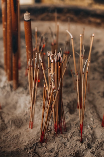 Photo burning brown incense sticks traditional spirituality details for meditation and relaxing