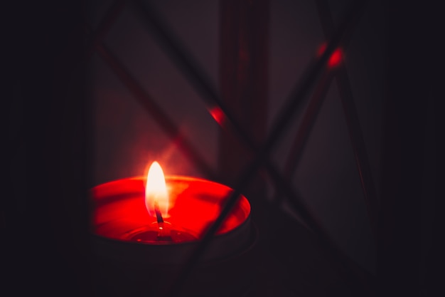 Burning candle in a Christmas lantern