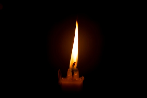 Burning candle in the darkx9xA