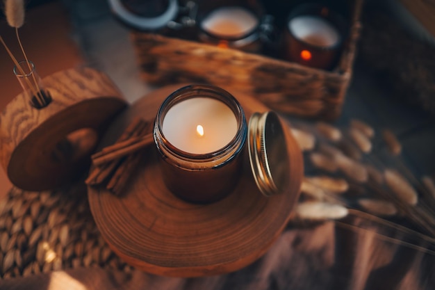 Burning candle in home interior aesthetics