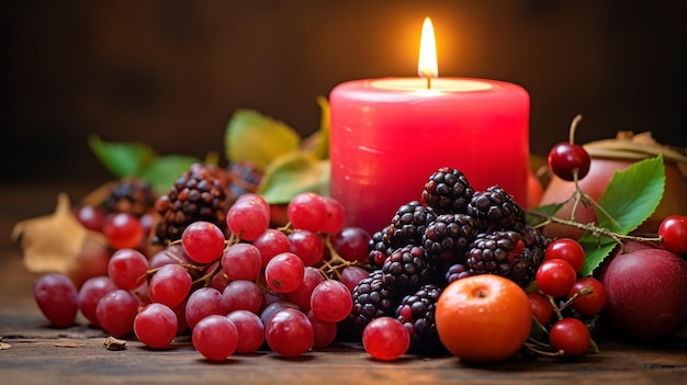 burning candle with harvested garden fruit and berry