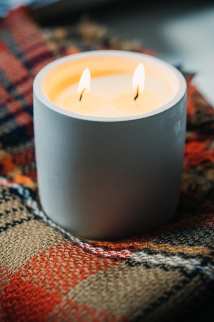 Burning candle with two wicks handmade candle in white jar