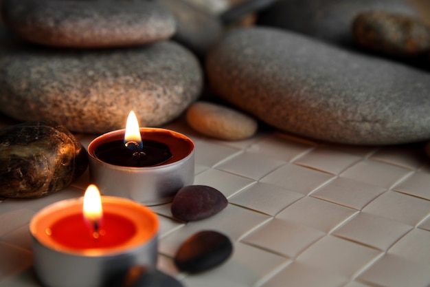 Burning candles. Stone therapy. Spa treatments.