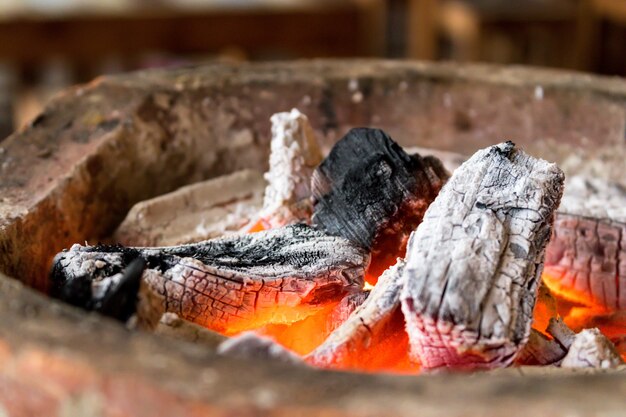 Burning charcoal with flame