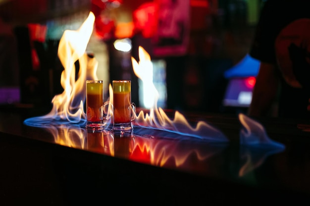 Burning cocktails on the bar